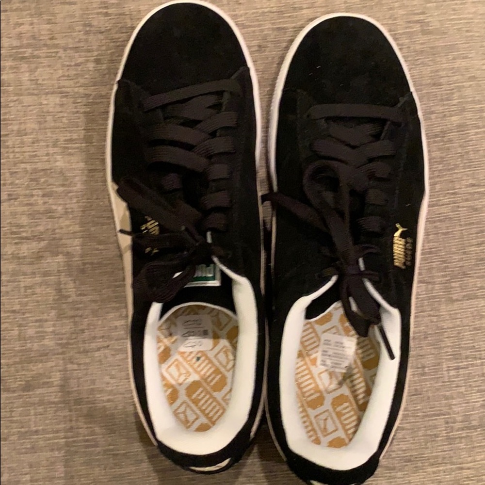 Puma suede black and white sneakers